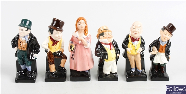 A collection of six Royal Doulton Charles Dickens figurines