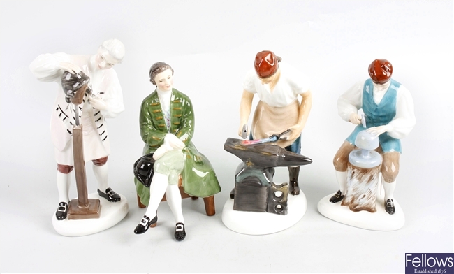 A collection of four Royal Doulton figurines