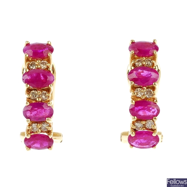 A pair of 18ct gold ruby and diamond ear studs. 