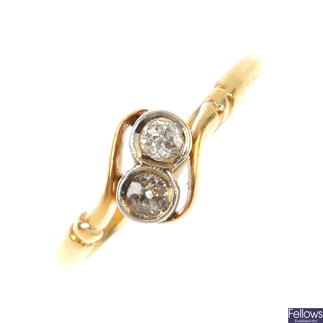 An early 20th century 18ct gold and platinum diamond two-stone ring. 