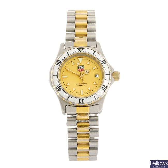 (951000760) A bi-colour quartz lady's Tag Heuer 2000 Series bracelet watch.
