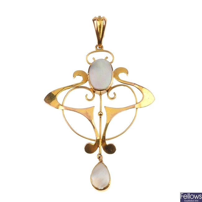 An early 20th century 9ct gold mother-of-pearl pendant.