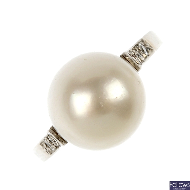 A mid 20th century platinum cultured pearl and diamond ring.
