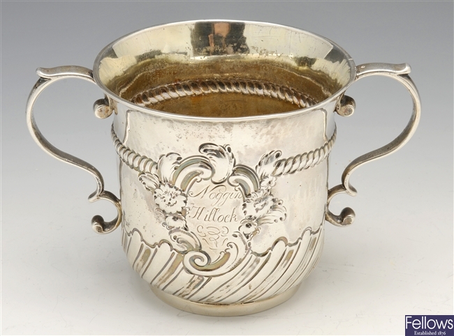 A George II silver porringer.