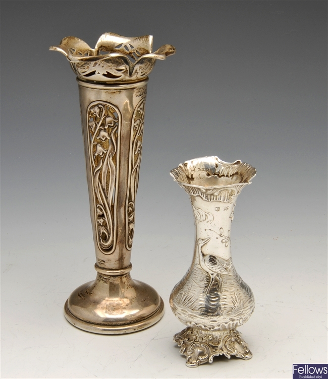 Two turn of the century silver bud vases.