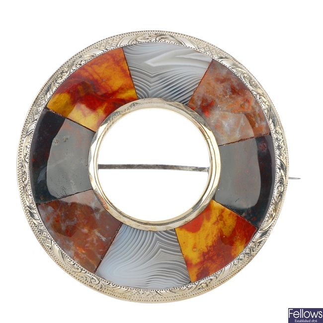 A late 19th century silver agate brooch.