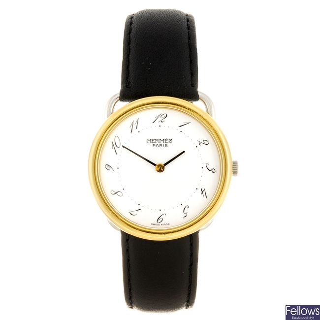 A bi-colour quartz gentleman's Hermès Arceau wrist watch.