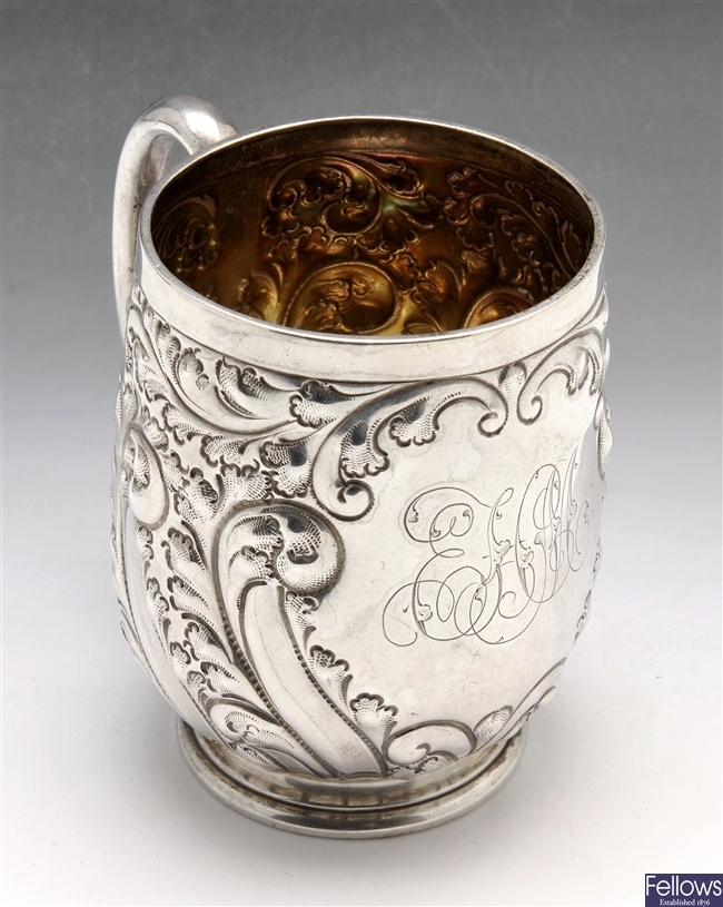 A late Victorian silver christening mug.