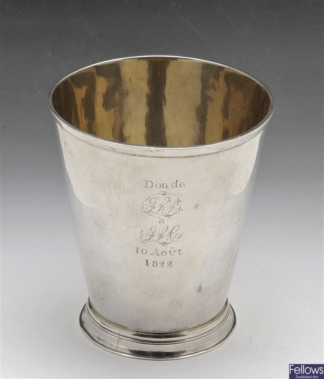 A George IV silver tapered beaker.