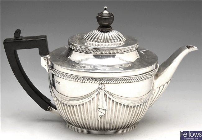 A late Victorian silver teapot.