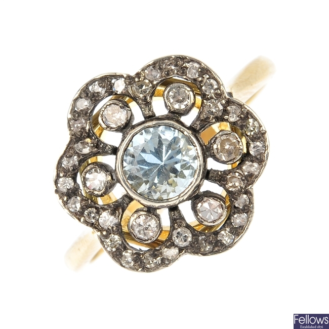 An aquamarine and diamond floral cluster ring.