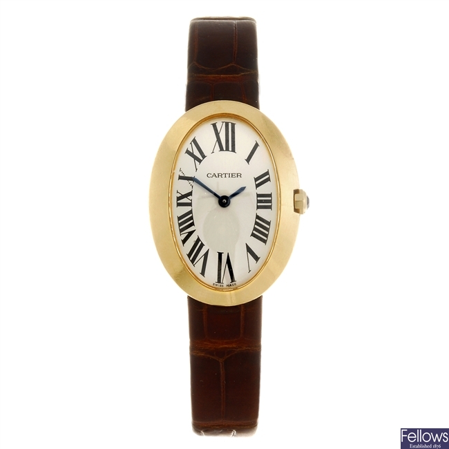 An 18k gold quartz Cartier Baignoire wrist watch.