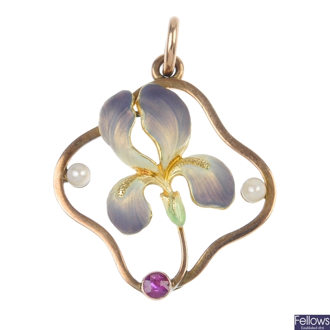 An early 20th century 9ct gold enamel gem-set iris pendant.