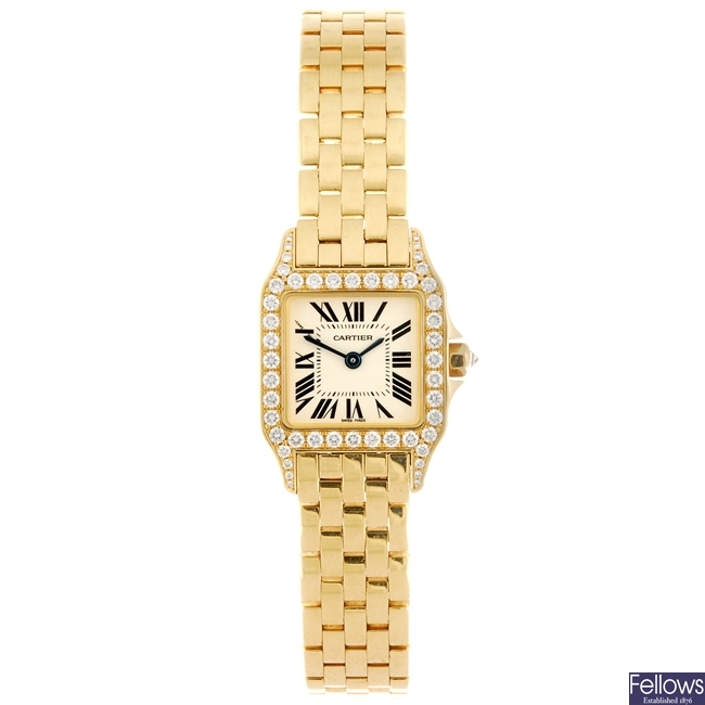 (605013496) An 18k gold quartz Cartier Santos Demoiselle bracelet watch.
