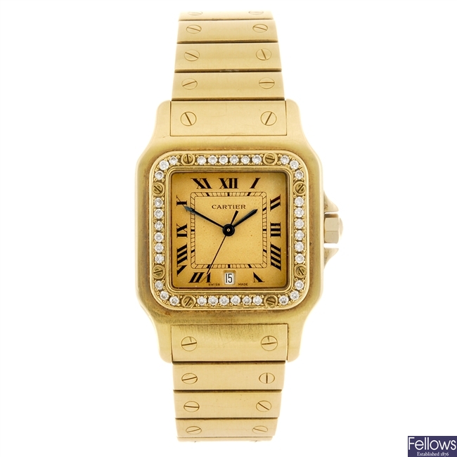(127132994) An 18k gold quartz Cartier Santos bracelet watch.