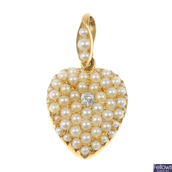 An Edwardian gold diamond and split pearl heart pendant.
