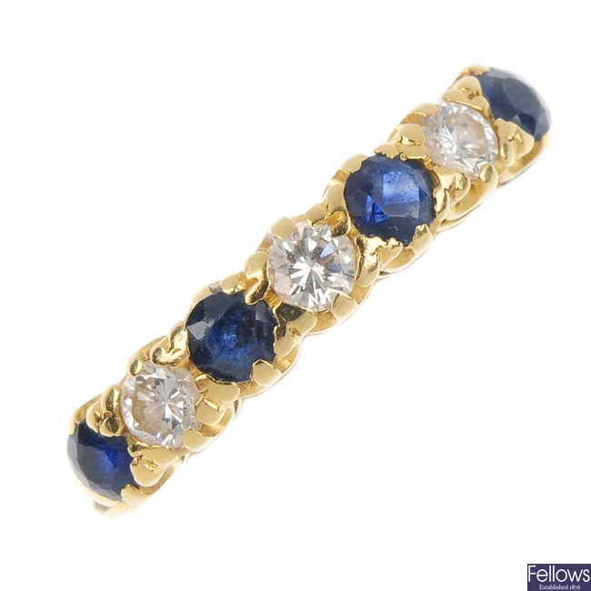 An 18ct gold sapphire and diamond seven-stone ring.