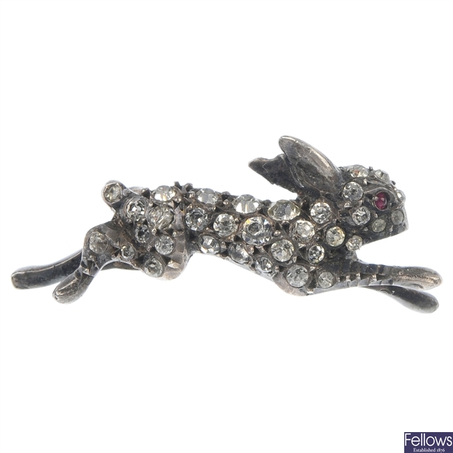 An early 20th century silver paste hare brooch.