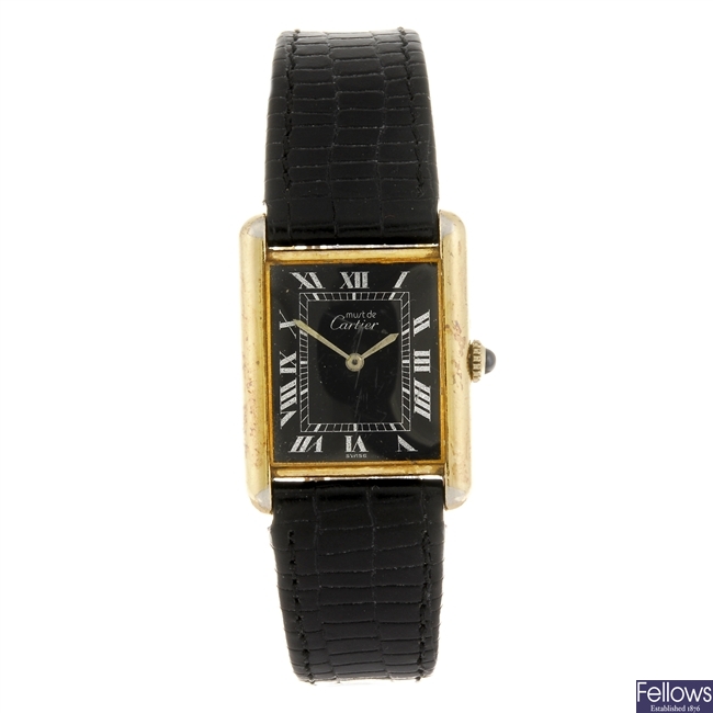 A gold plated silver manual wind Must de Cartier wrist watch.