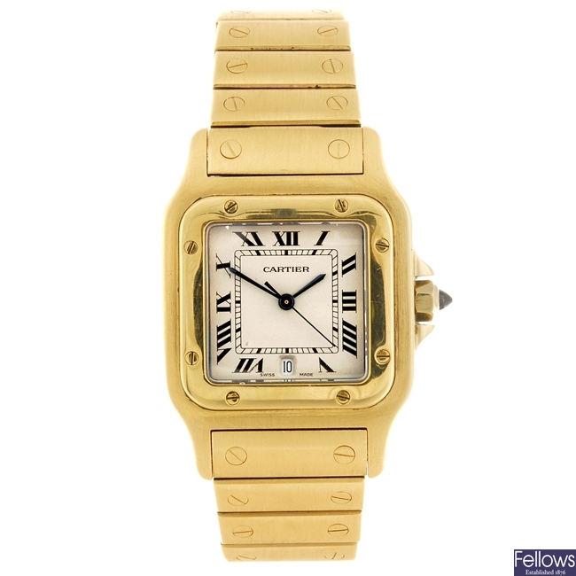 An 18k gold quartz Cartier Santos bracelet watch.