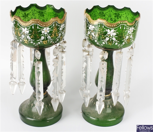A pair of early 20th century green glass table lustres