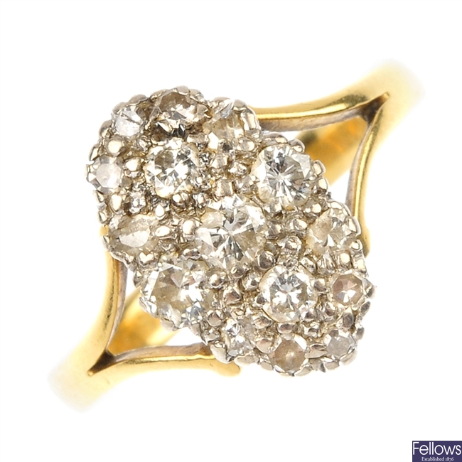 A mid 20th century 18ct gold diamond cluster ring.