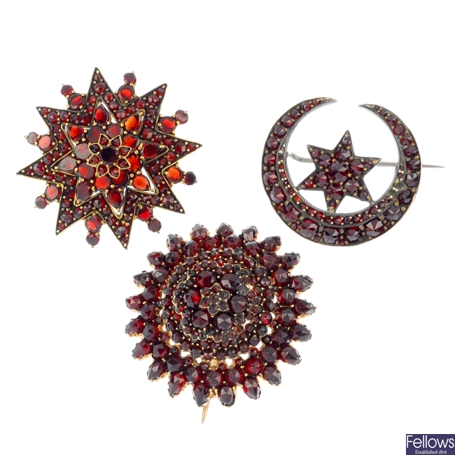 A selection of three late 19th century garnet and paste brooches.
