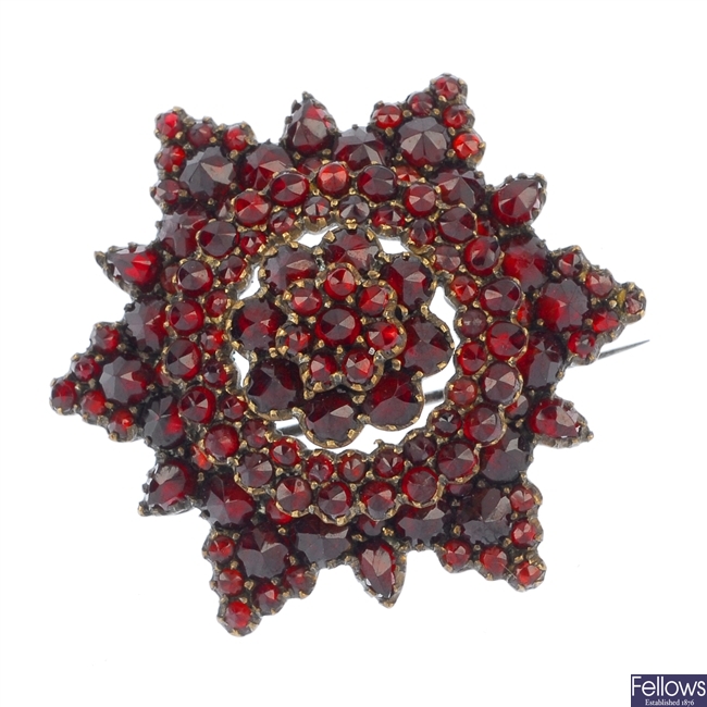 A selection of three items of late 19th century garnet and paste jewellery.