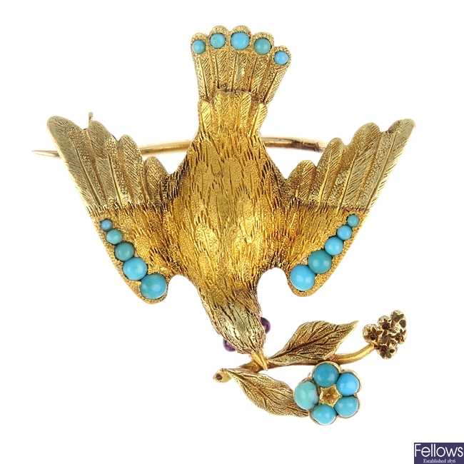 An early 20th century gold turquoise and ruby dove sentimental brooch.