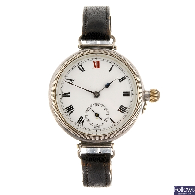 A silver manual wind gentleman's Longines trench style wrist watch.