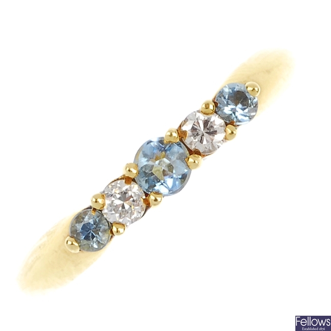 An 18ct gold aquamarine and diamond five-stone ring.
