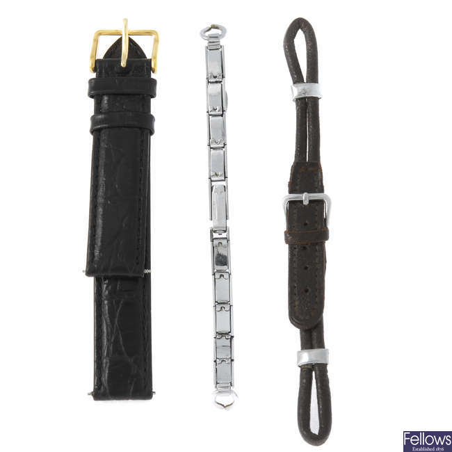 AA bag of various watch straps and bracelets, including examples by Tissot and Apollo.