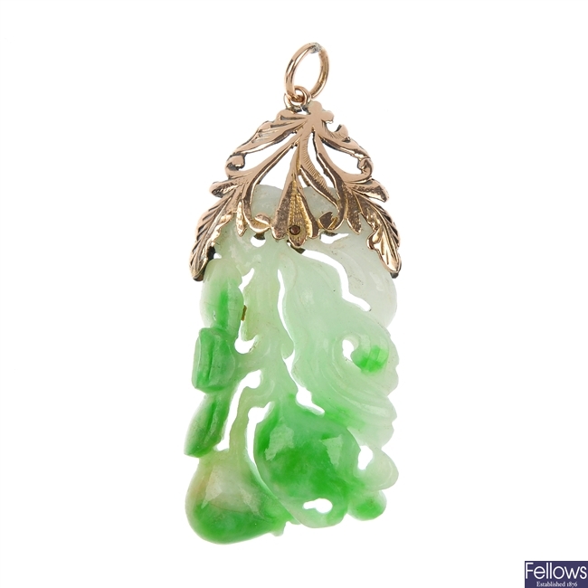 A carved jade pendant.