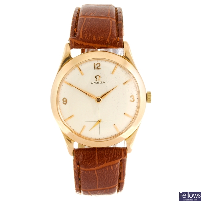(116196025) A 14k gold manual wind gentleman's Omega wrist watch.