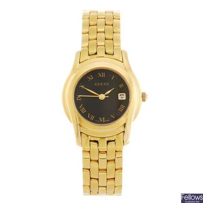 (116196204) A gold plated quartz lady's Gucci 5400L bracelet watch.