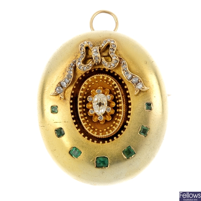 A late 19th century gold diamond and emerald pendant.