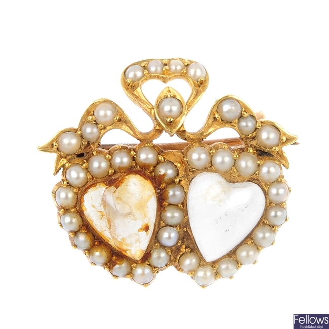 A late 19th century gold moonstone and split pearl brooch.