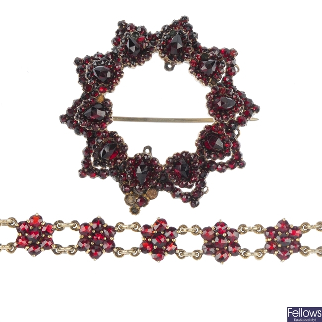 A selection of late 19th century garnet and red paste jewellery.