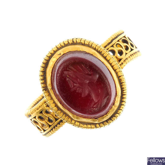 A Roman gold carnelian intaglio ring. 