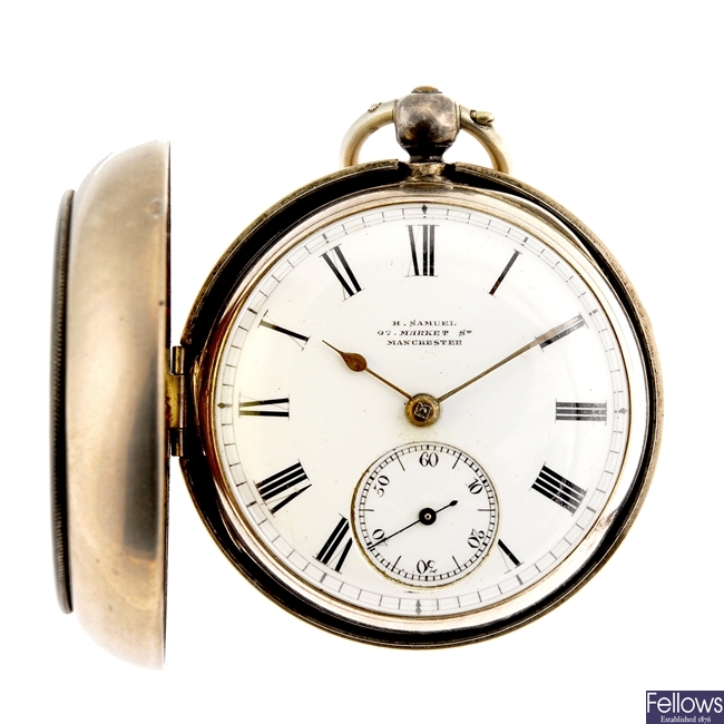 A silver key wind open face pocket watch by H.Samuel and silver chain.