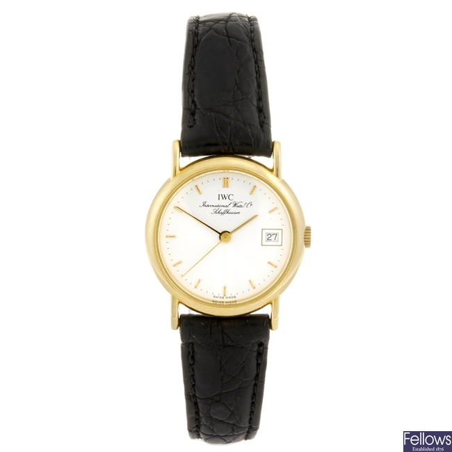An 18k gold quartz lady's IWC wrist watch.