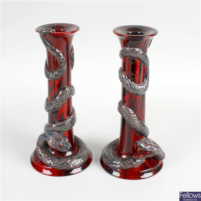A pair of Royal Doulton Archives Year of the Snake candlesticks