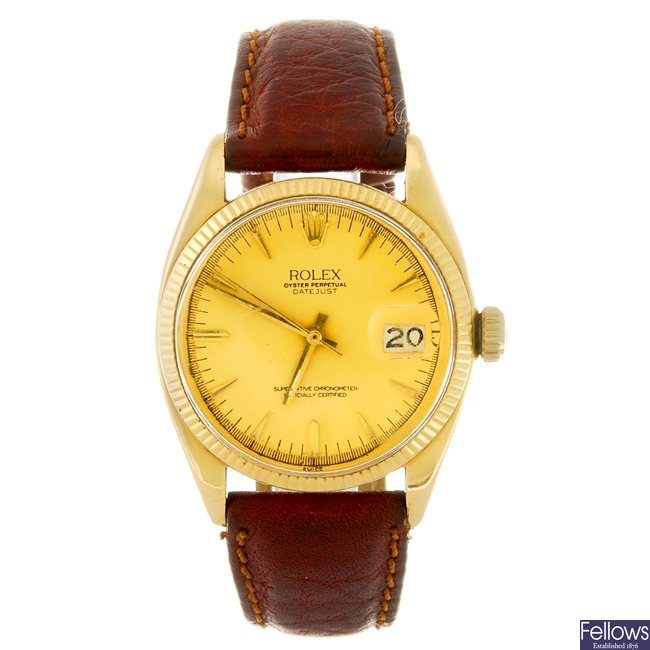 An 18k gold automatic gentleman's Rolex Datejust wrist watch.