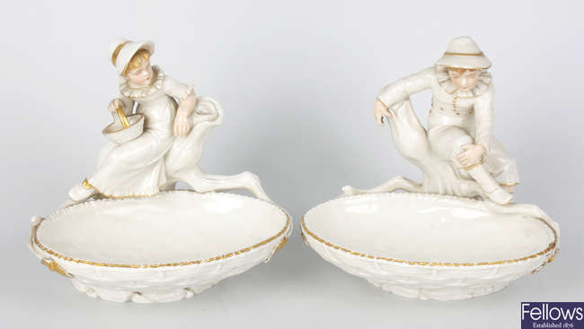 A pair of late Victorian Royal Worcester porcelain figural dishes by James Hadley