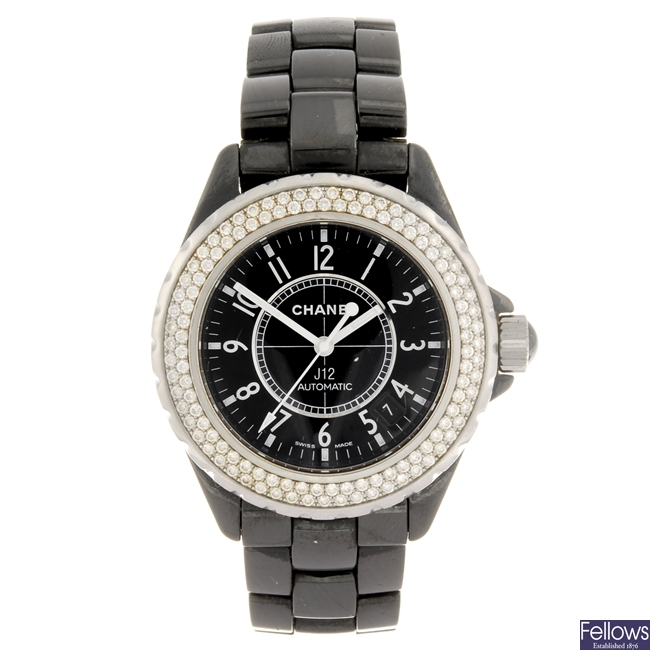 A black ceramic automatic Chanel J12 bracelet watch.