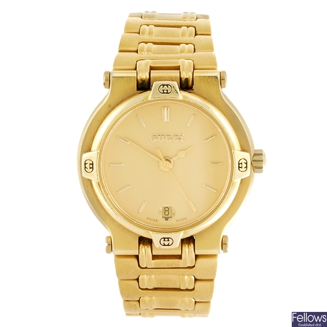 (116196969) A gold plated quartz lady's Gucci 9200L bracelet watch.
