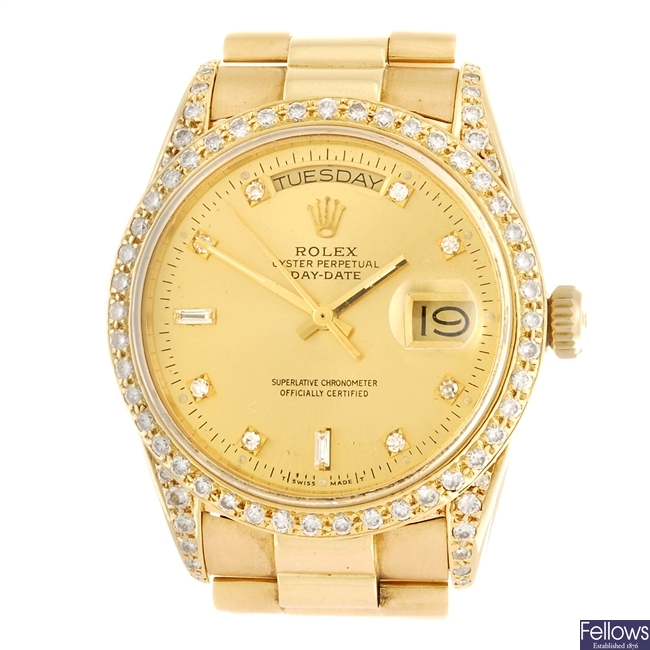 (1061027214) An 18k gold automatic gentleman's Rolex Oyster Perpetual Day-Date bracelet watch.