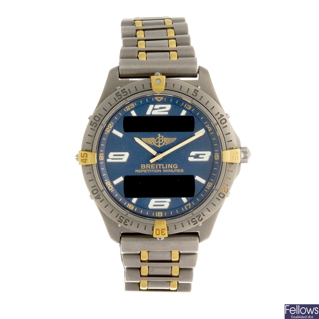 (1011039218) A titanium quartz gentleman's Breitling Aerospace bracelet watch.