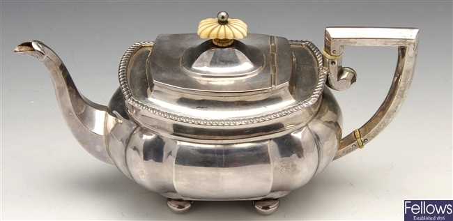 An Edwardian silver teapot.