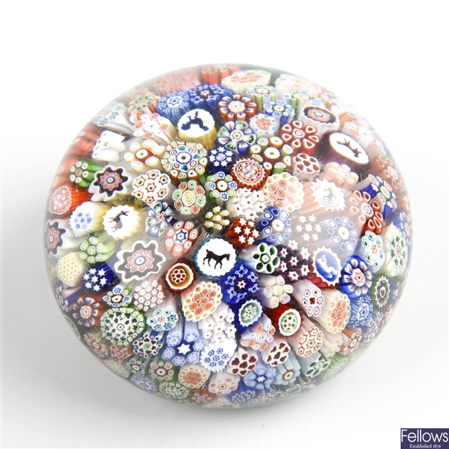 A Baccarat close packed millefiori silhouette cane paperweight